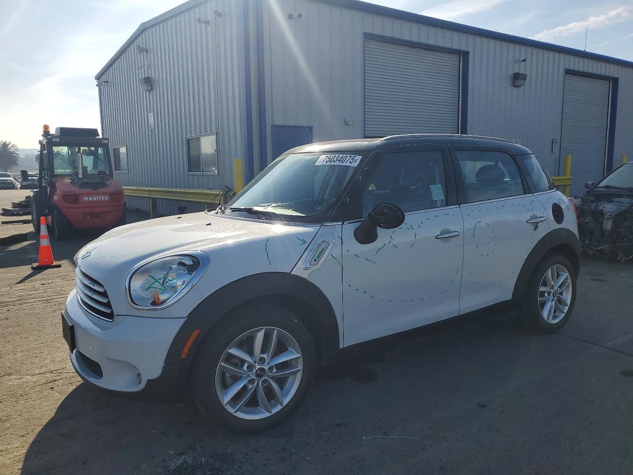 2014 MINI Countryman, VIN WMWZB3C51EWM32236 — Vandalism