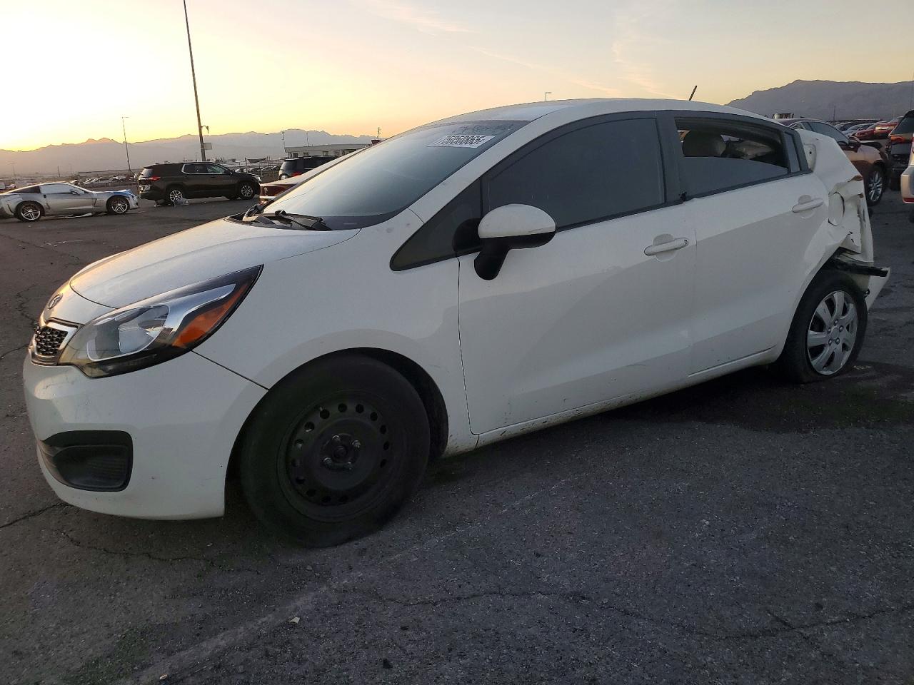 2013 Kia Rio LX, VIN KNADM4A36D6124232 — Rear end