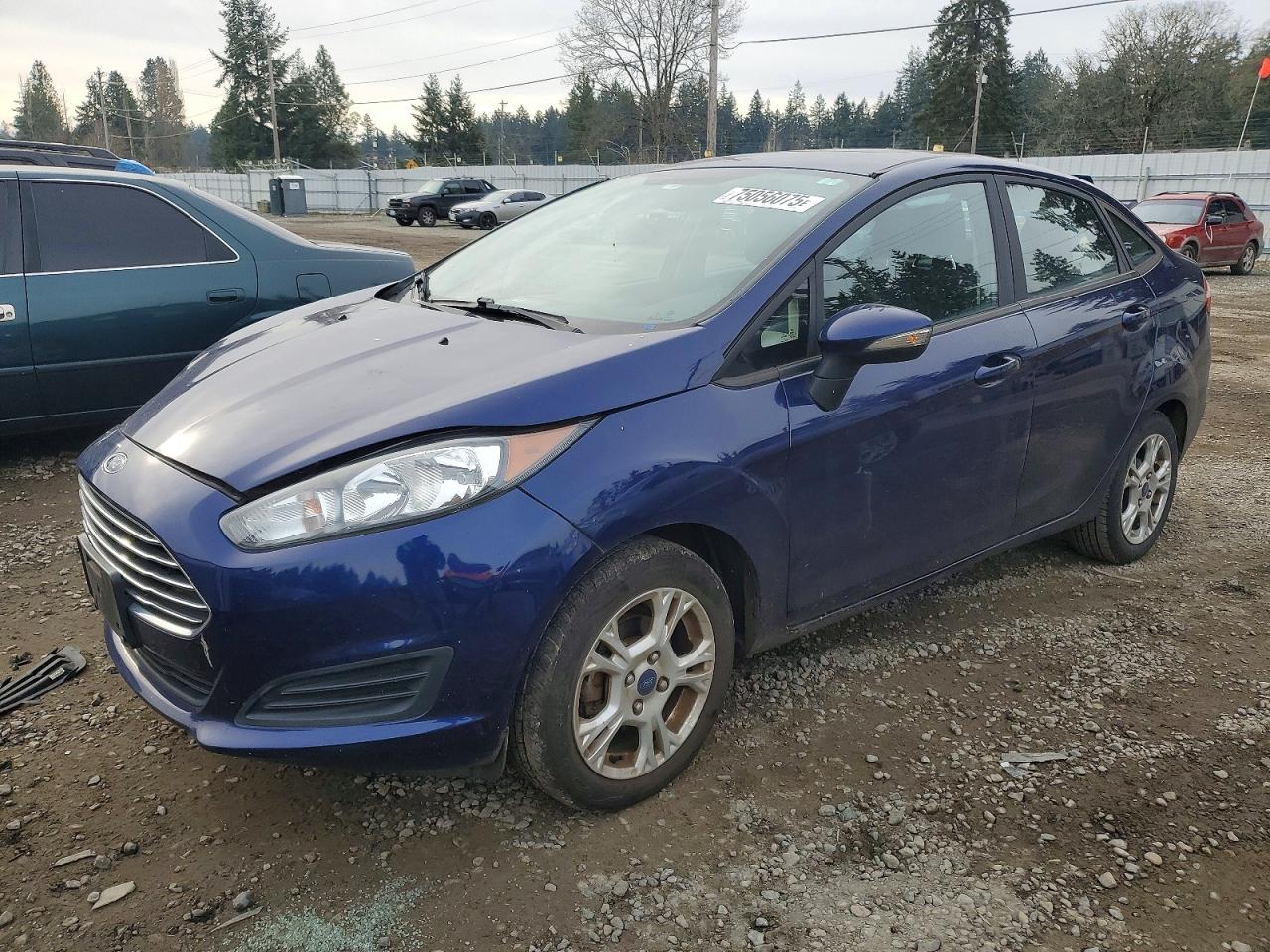 2016 Ford Fiesta SE, VIN 3FADP4BJ1GM167698 — Auction photo