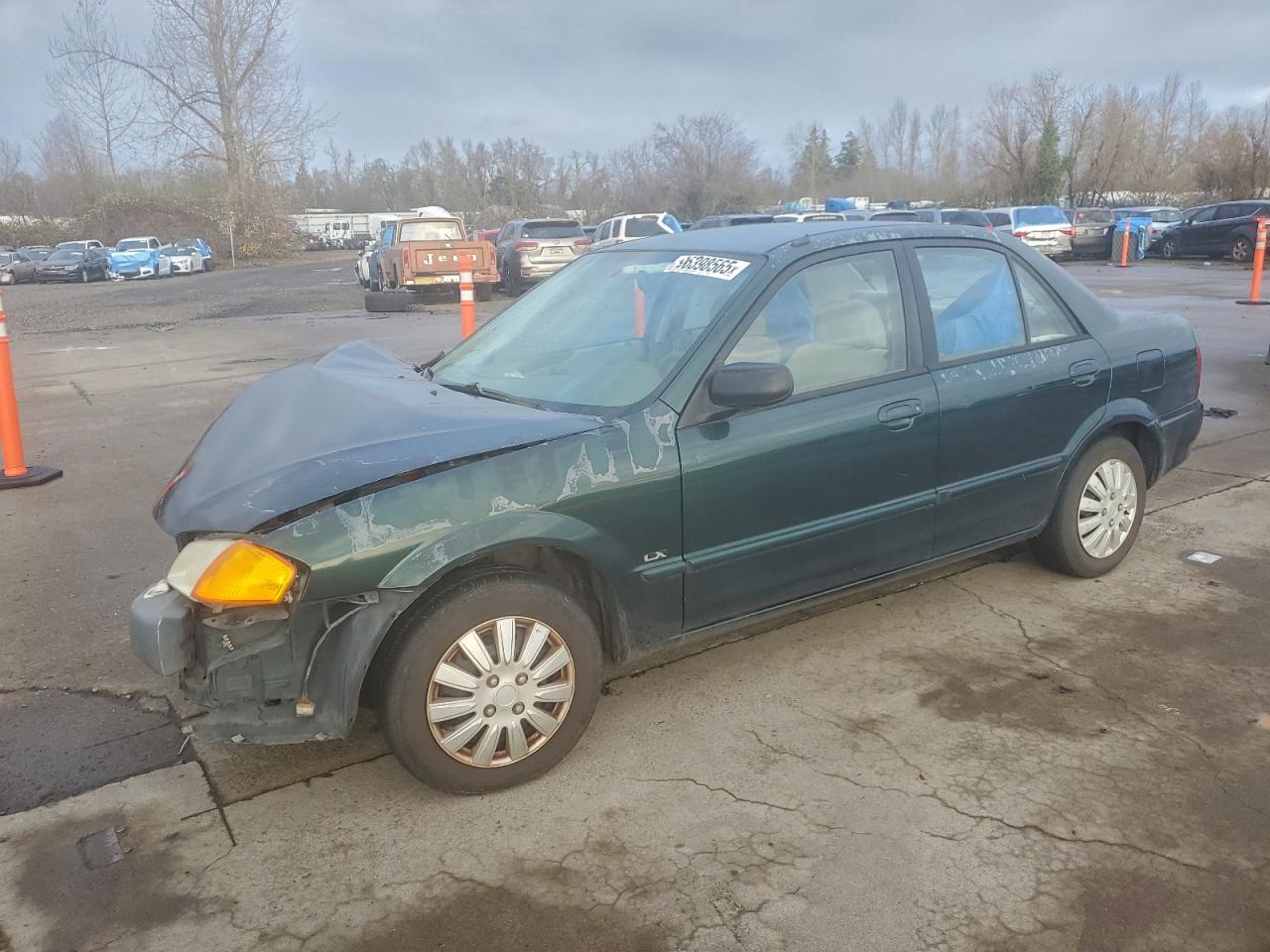 2000 Mazda Protege DX, VIN JM1BJ2225Y0218642 — Front end