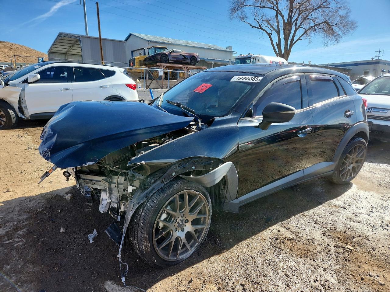 2019 Mazda CX-3 Touring, VIN JM1DKDC76K0402538 — Front end
