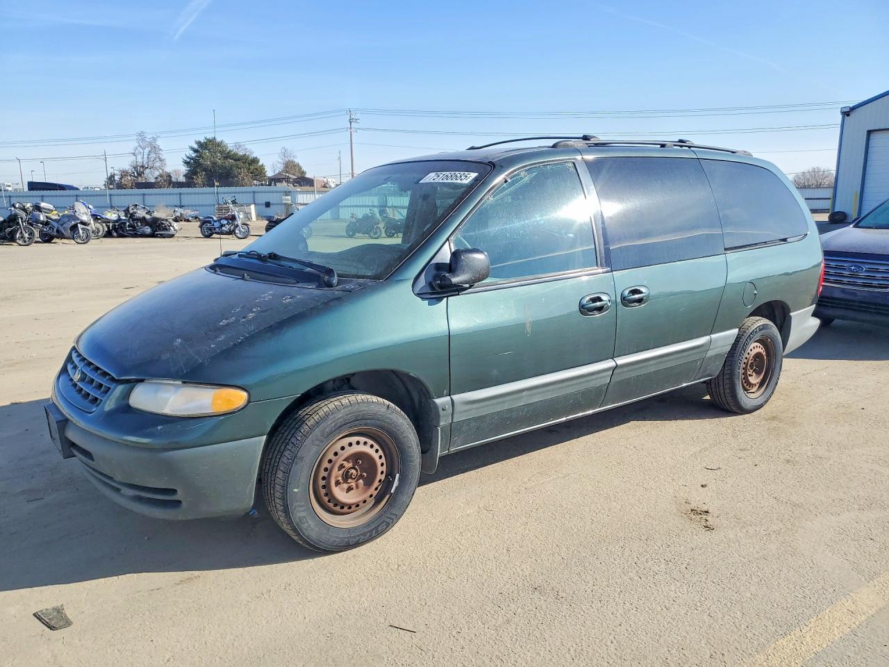 2000 Chrysler Voyager SE, VIN 1C4GJ44G6YB803597 — Бок