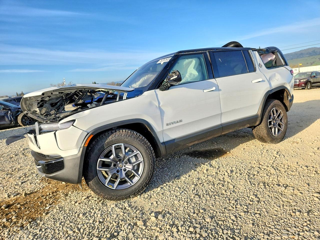 2025 Rivian R1S Adventure, VIN 7PDSGBBA7SN056991 — Rollover