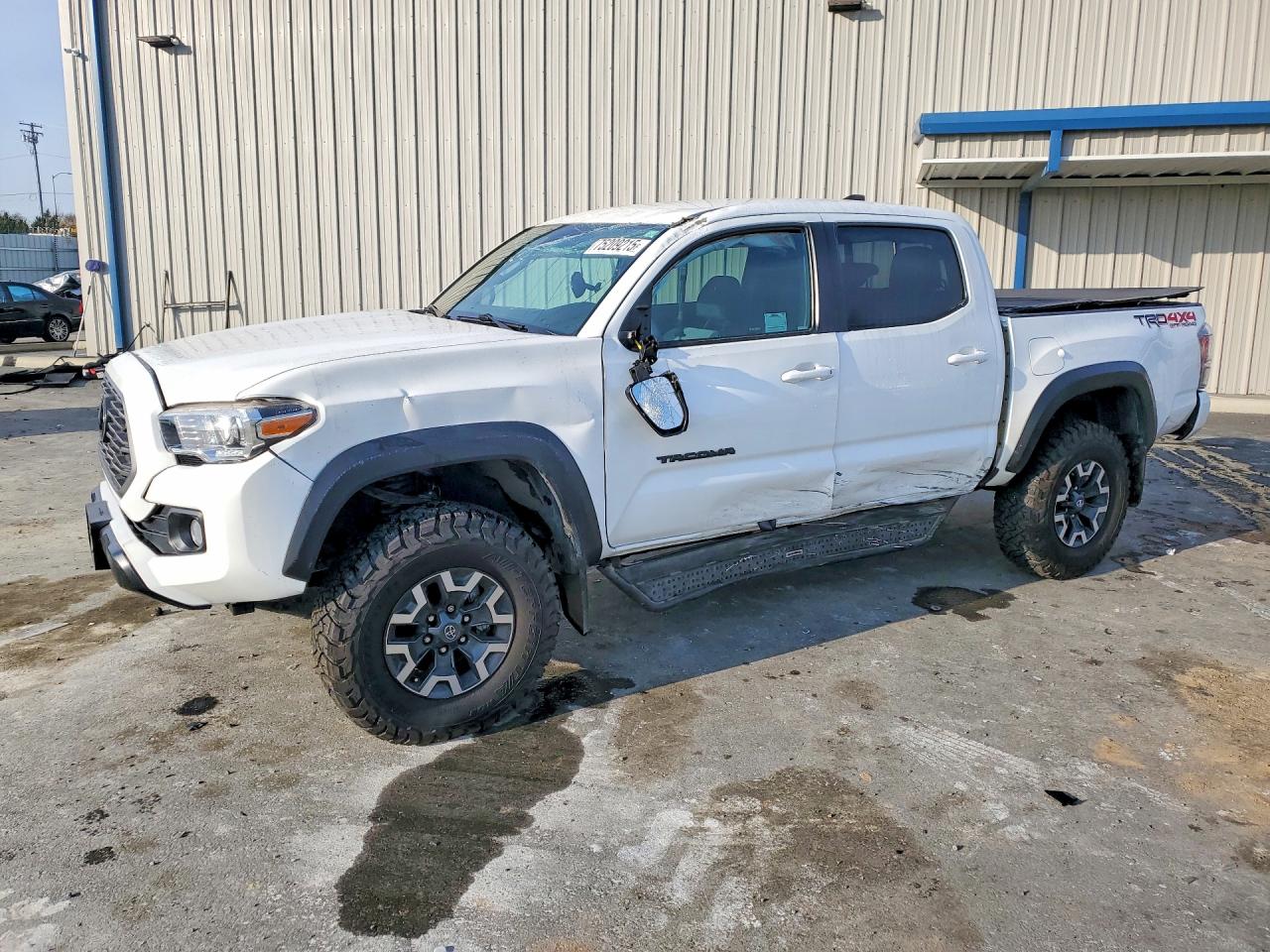2021 Toyota Tacoma TRD Off Road, VIN 3TMCZ5AN4MM440882 — Side