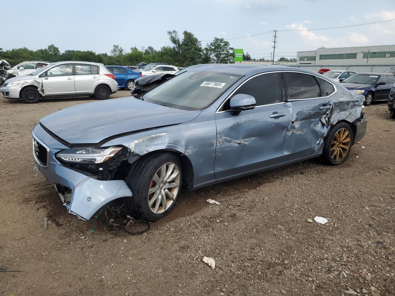 2017 Volvo S90 Momentum, VIN YV1A22MK2H1014956 — Side