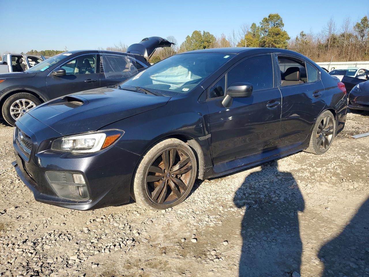 2016 Subaru WRX Limited, VIN JF1VA1J65G8816585 — Side