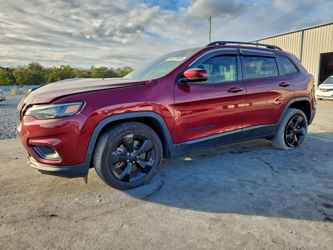 2019 Jeep Cherokee Altitude, VIN 1C4PJLLB2KD369920 — Auction photo