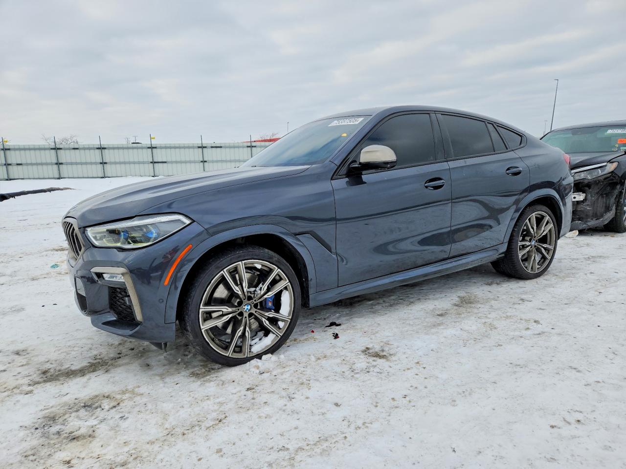 2020 BMW X6 M50i, VIN 5UXCY8C0XL9C87008 — Бок