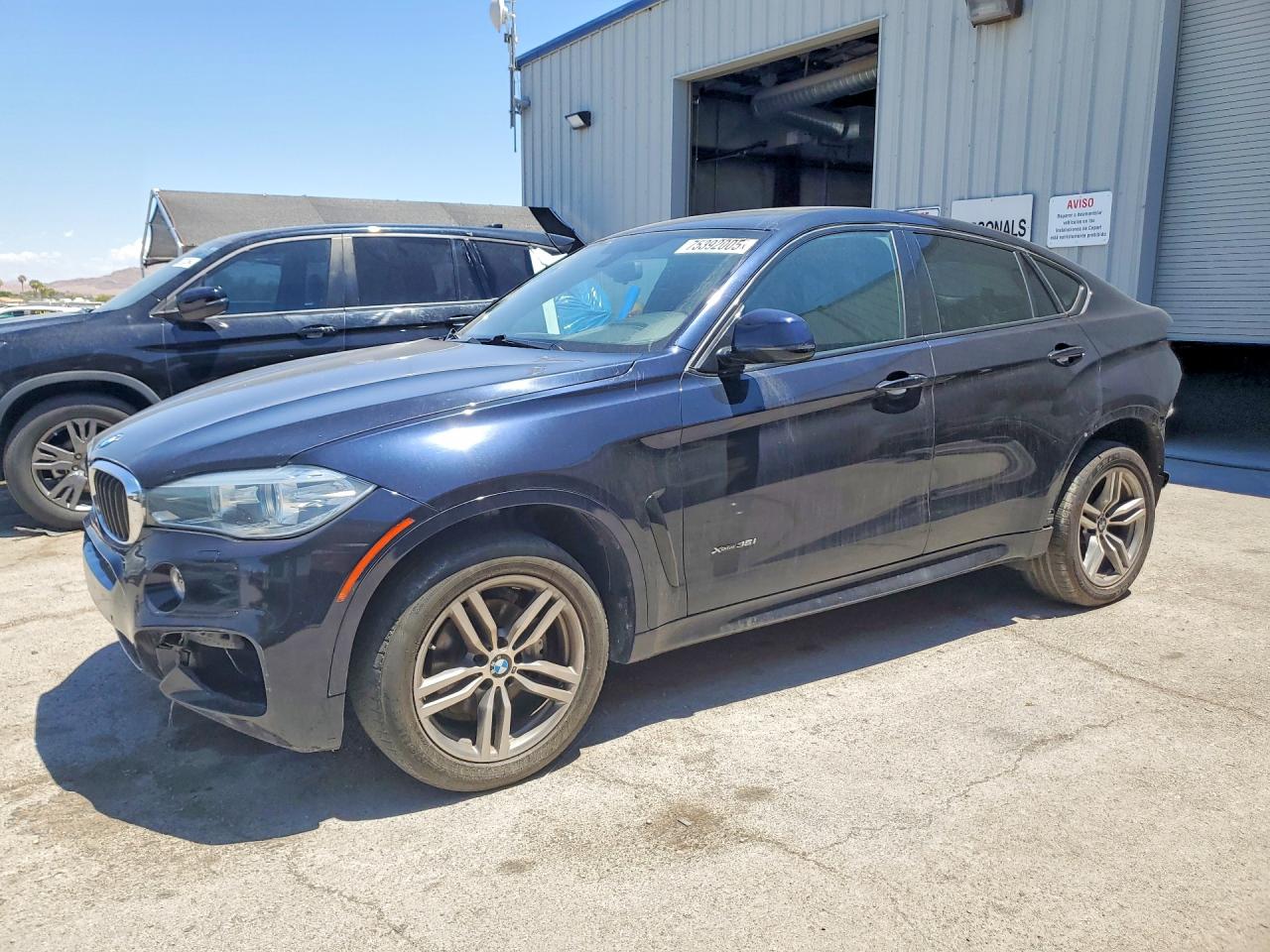 2016 BMW X6 xDrive35i, VIN 5UXKU2C58G0N82065 — Rear end