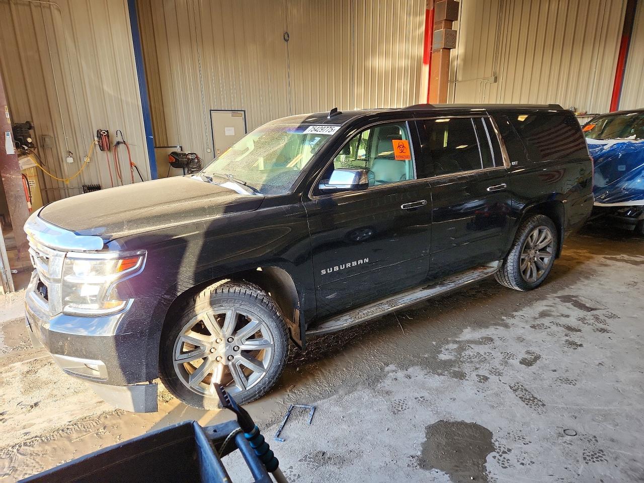 2015 Chevrolet Suburban LTZ, VIN 1GNSKKKCXFR258172 — Front end