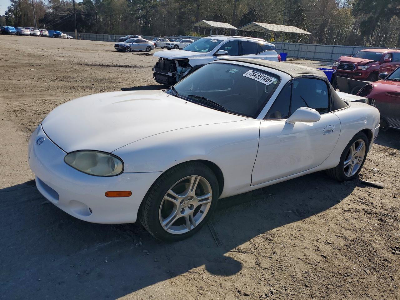 2004 Mazda MX-5 Miata LS, VIN JM1NB353X40409231 — Rear end
