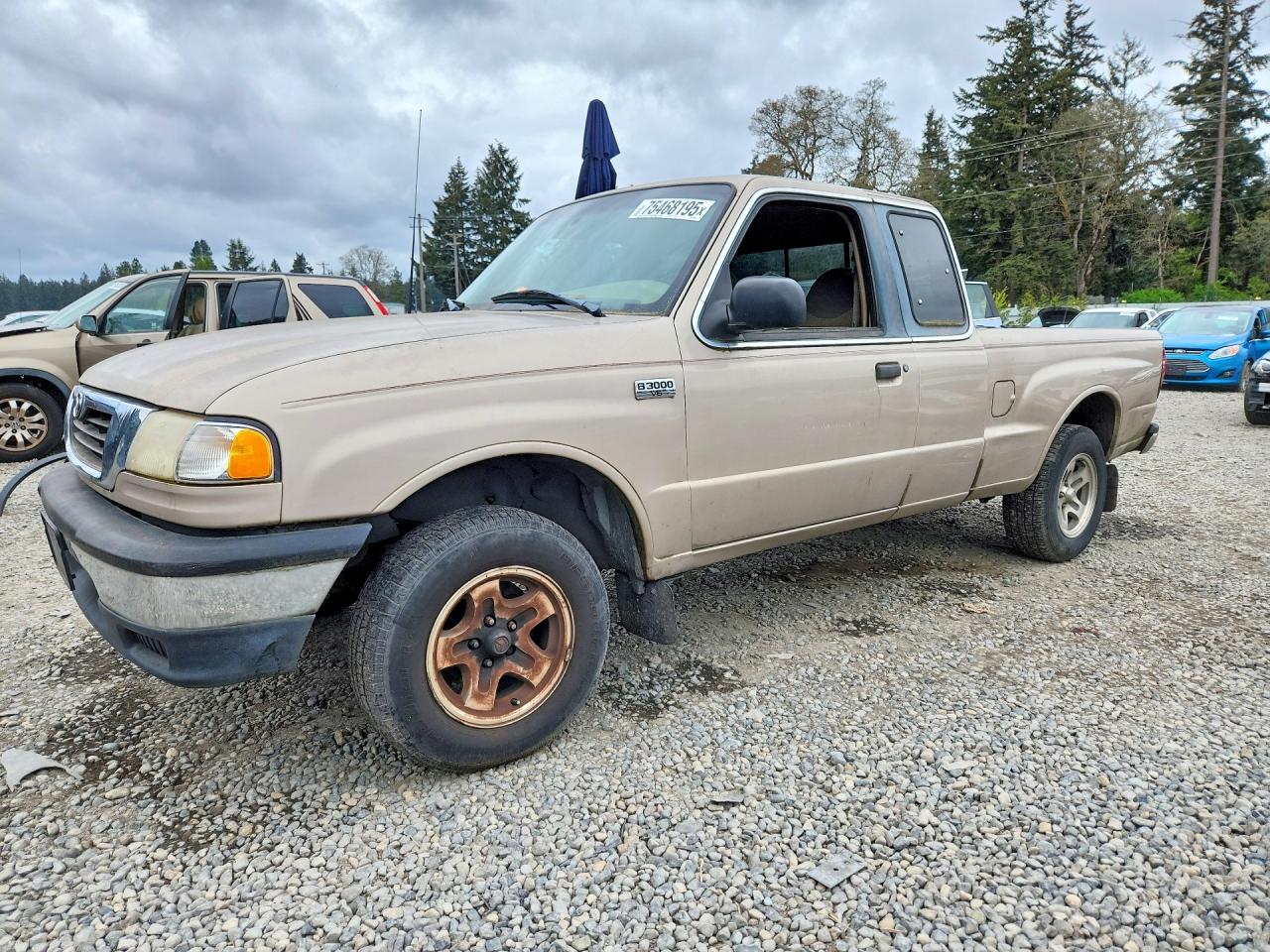 1998 Mazda B-Series DS, VIN 4F4YR16U3WTM05681 — Бок