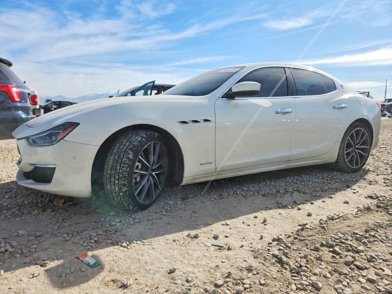 2021 Maserati Ghibli S Q4 GranLusso, VIN ZAM57YTL9M1365147 — Бок