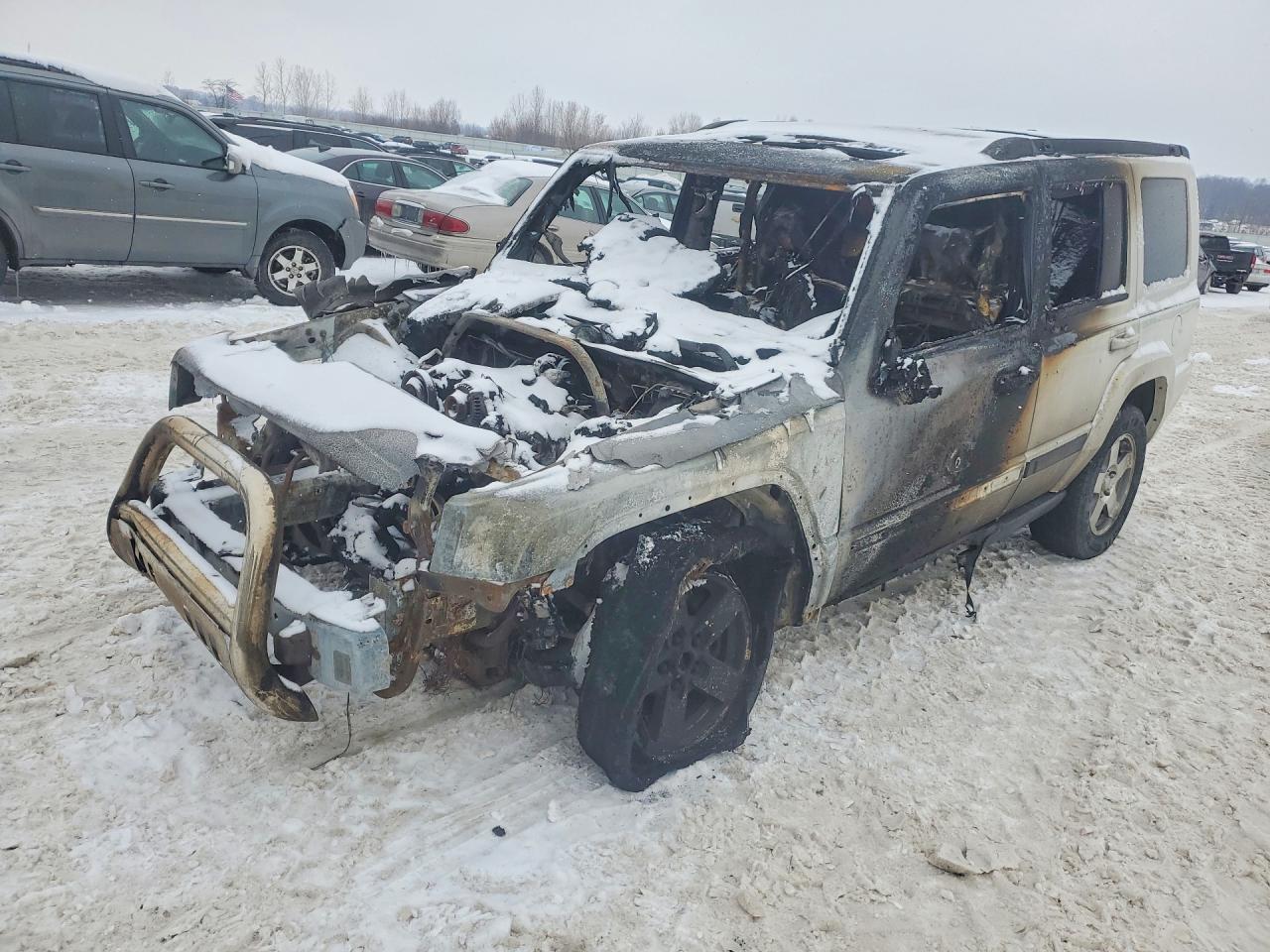 2008 Jeep Commander Sport, VIN 1J8HG48KX8C241272 — Burn