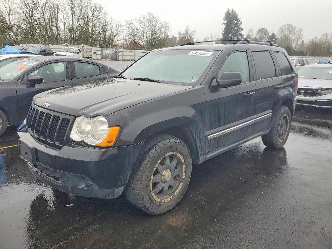 2010 Jeep Grand Cherokee Laredo, VIN 1J4PR4GK2AC147062 — Minor dents and scratches
