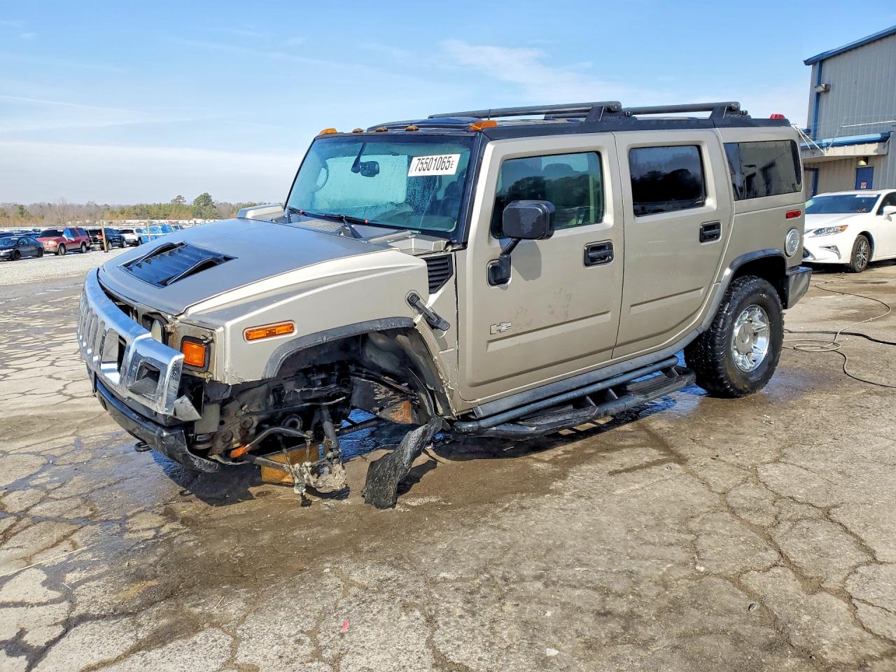 2003 Hummer H2, VIN 5GRGN23U63H146305 — Side