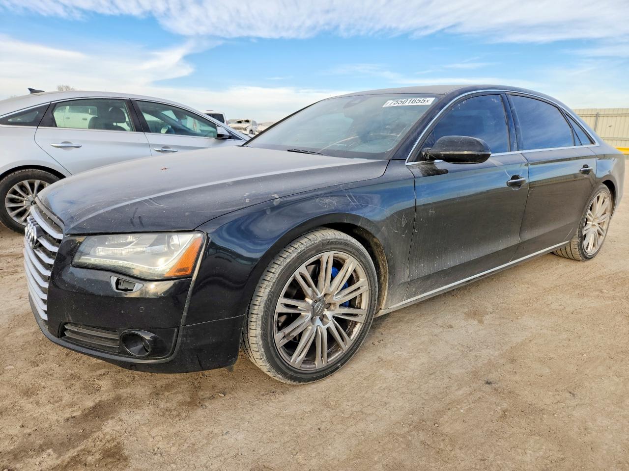 2011 Audi A8, VIN WAURVAFD9BN027547 — Vandalism