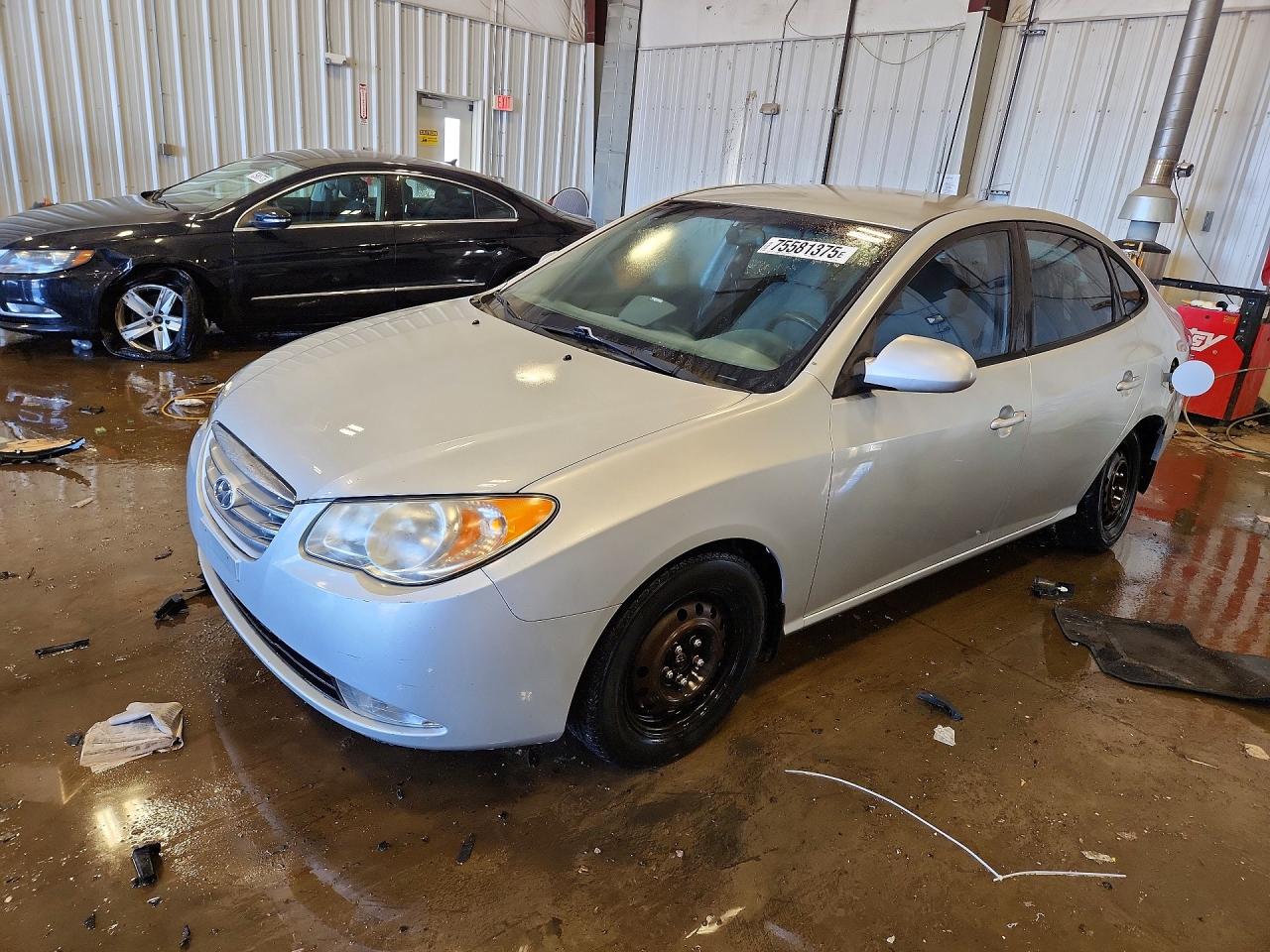 2010 Hyundai Elantra GLS, VIN KMHDU4AD2AU991996 — Rear end