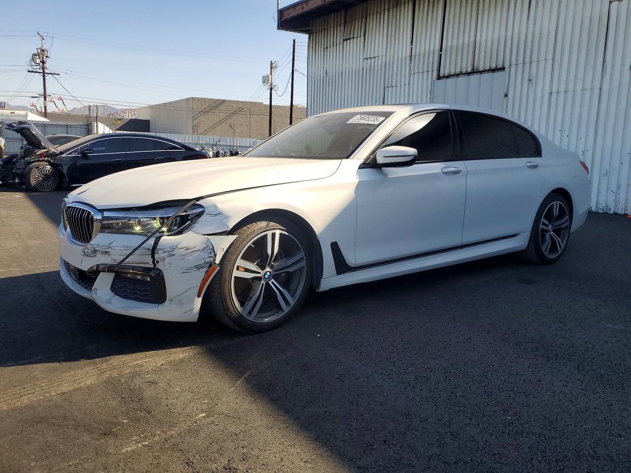 2016 BMW 7 Series 740i, VIN WBA7E2C57GG738685 — Front end
