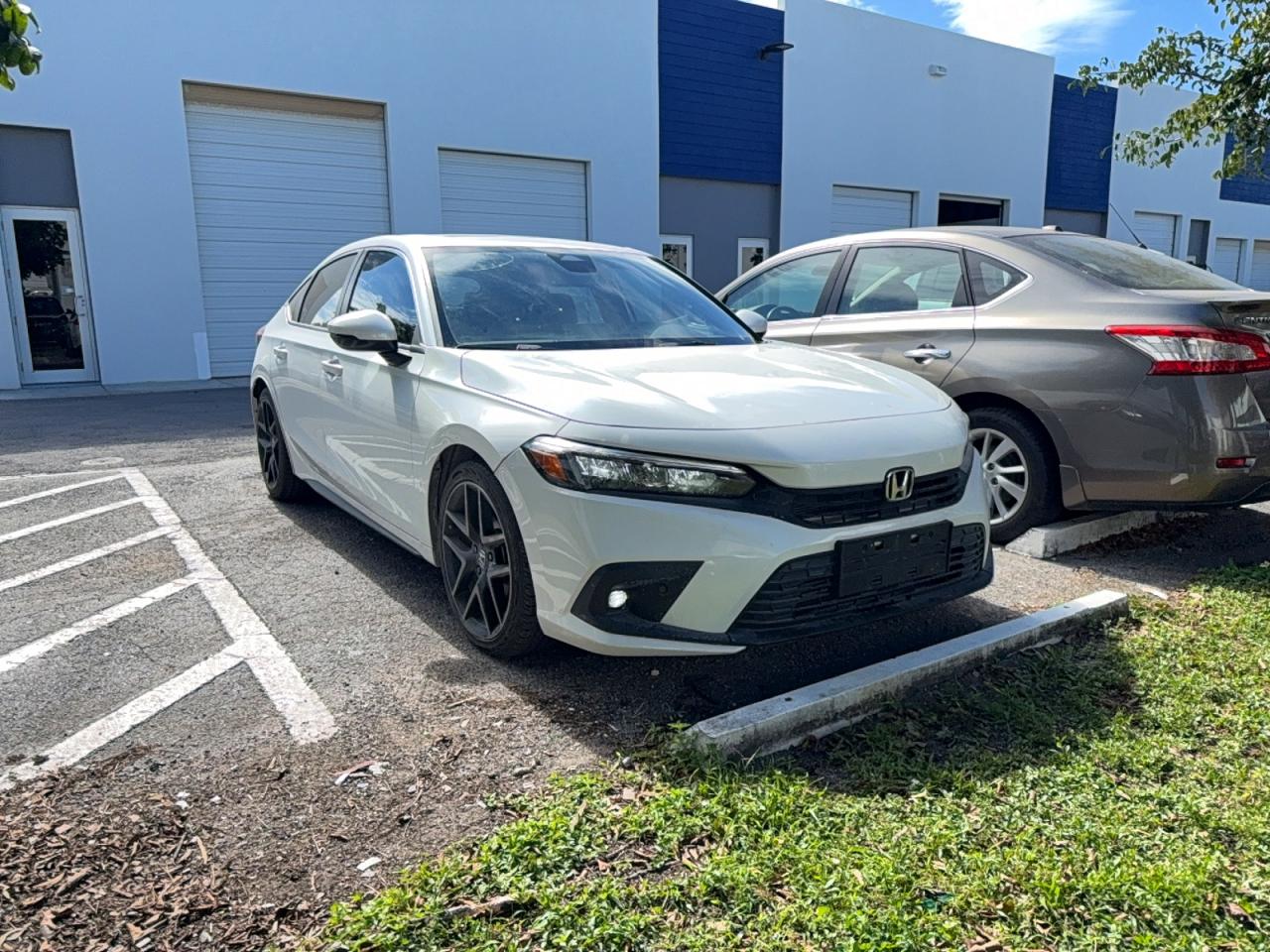 2022 Honda Civic Sport Touring, VIN 19XFL1H83NE022705 — Prior damage history