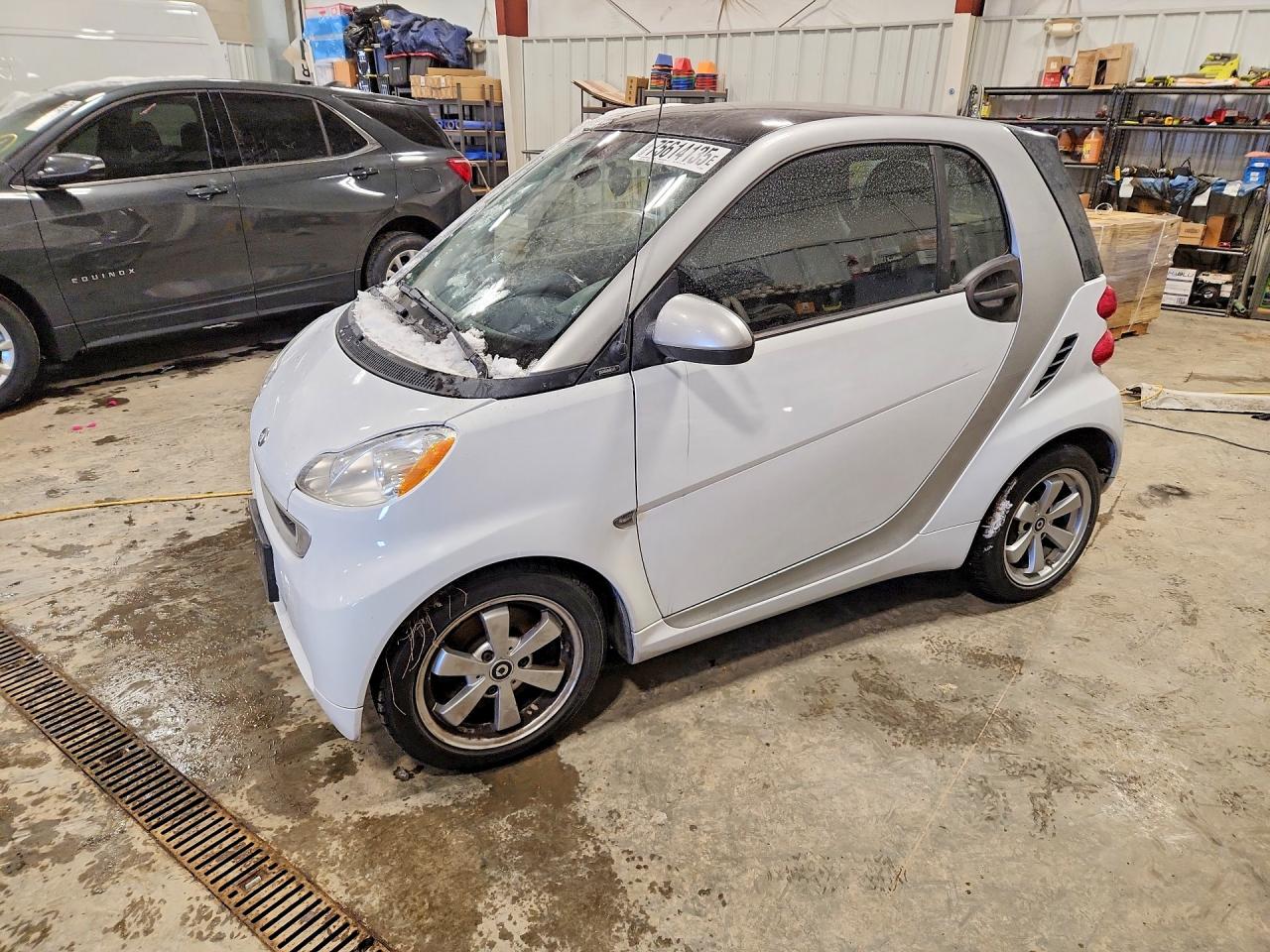 2012 Smart fortwo Pure, VIN WMEEJ3BA2CK528014 — Side