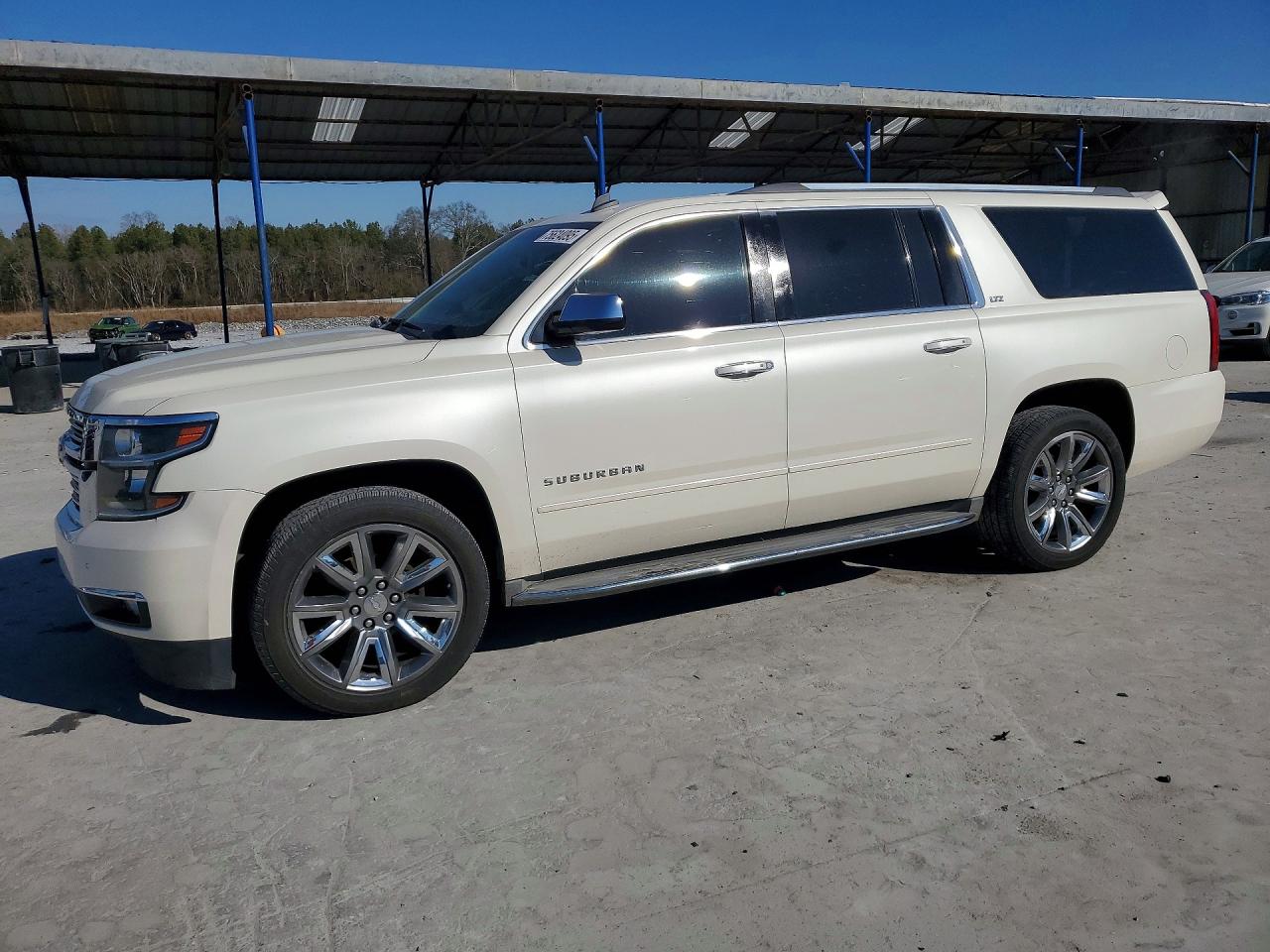 2015 Chevrolet Suburban LTZ, VIN 1GNSCKKC0FR166517 — Rear end