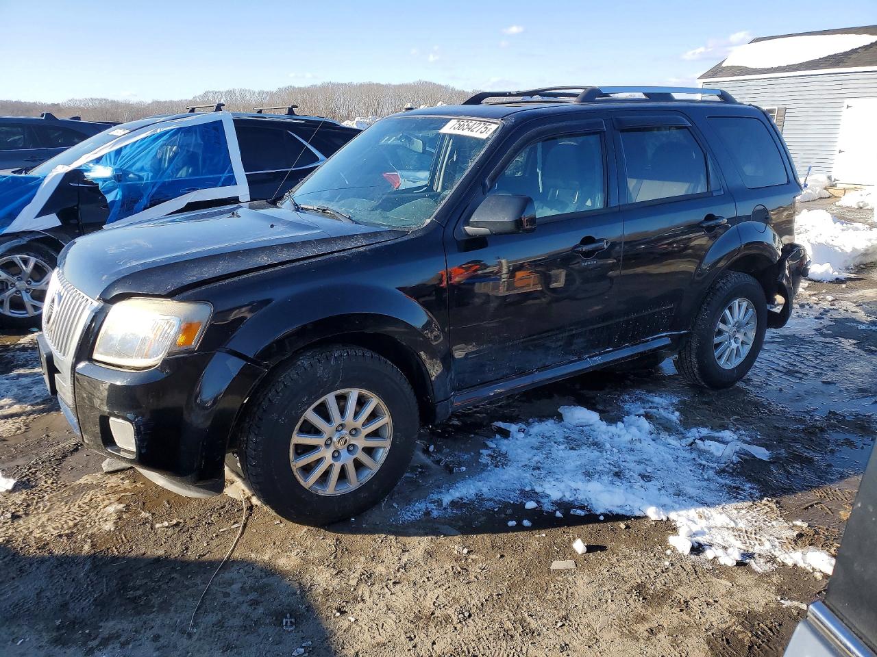 2010 Mercury Mariner Premier, VIN 4M2CN9HGXAKJ12129 — Rollover