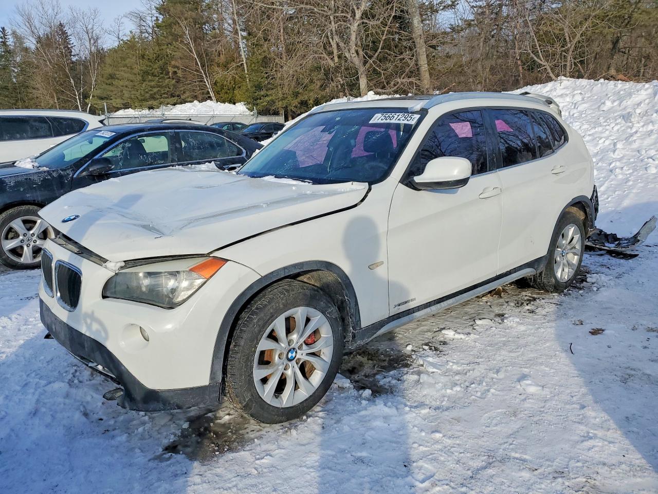 2012 BMW X1 28i, VIN WBAVL1C5XCVR77936 — Rear end