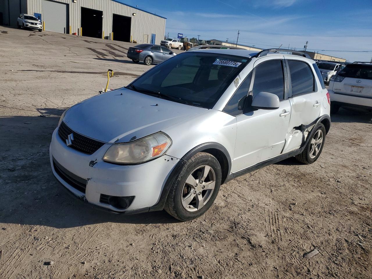 2012 Suzuki SX4 Crossover, VIN JS2YB5A34C6306550 — Side