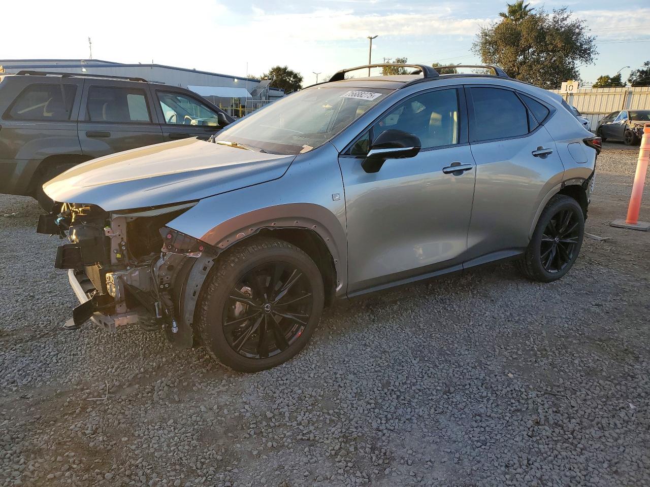 2025 Lexus NX 450h+ F SPORT Handling, VIN JTJKKCFZ7S2071257 — Перед