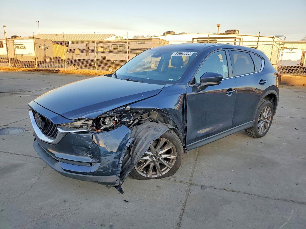 2021 Mazda CX-5 Grand Touring, VIN JM3KFBDM9M1386554 — Front end