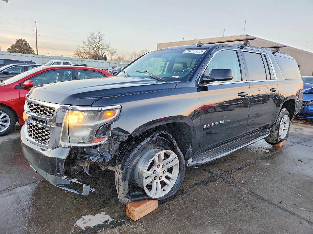 2015 Chevrolet Suburban LT, VIN 1GNSKJKC3FR274322 — Front end