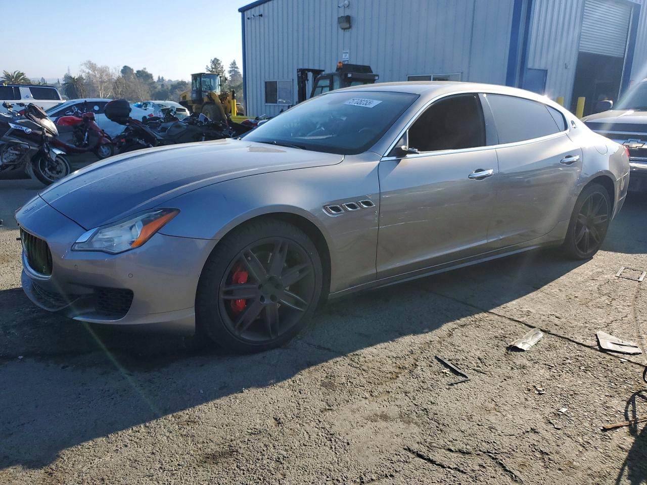 2016 Maserati Quattroporte S, VIN ZAM56RPA6G1188627 — Side