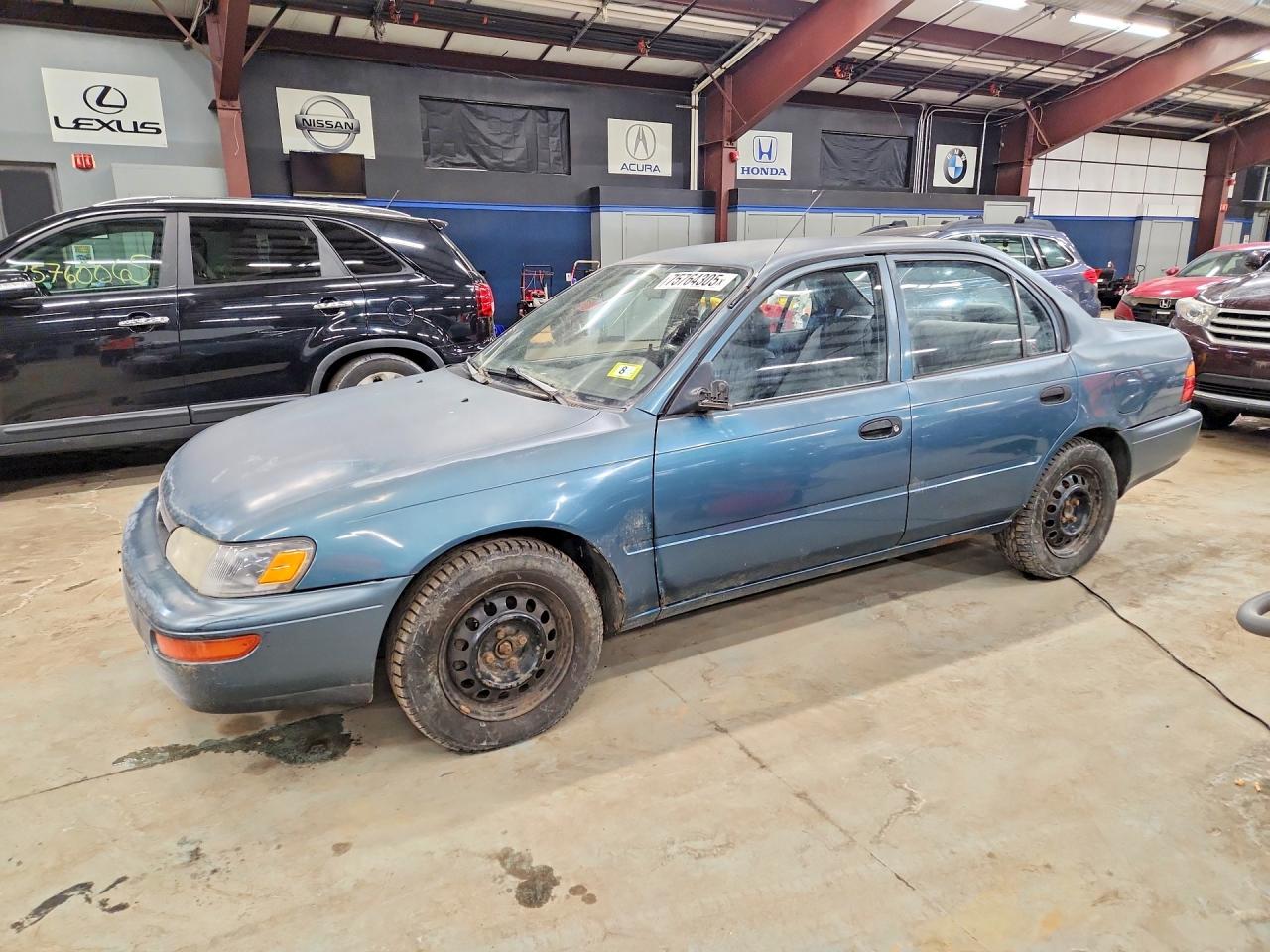 1995 Toyota Corolla, VIN JT2AE04B6S0092213 — Side