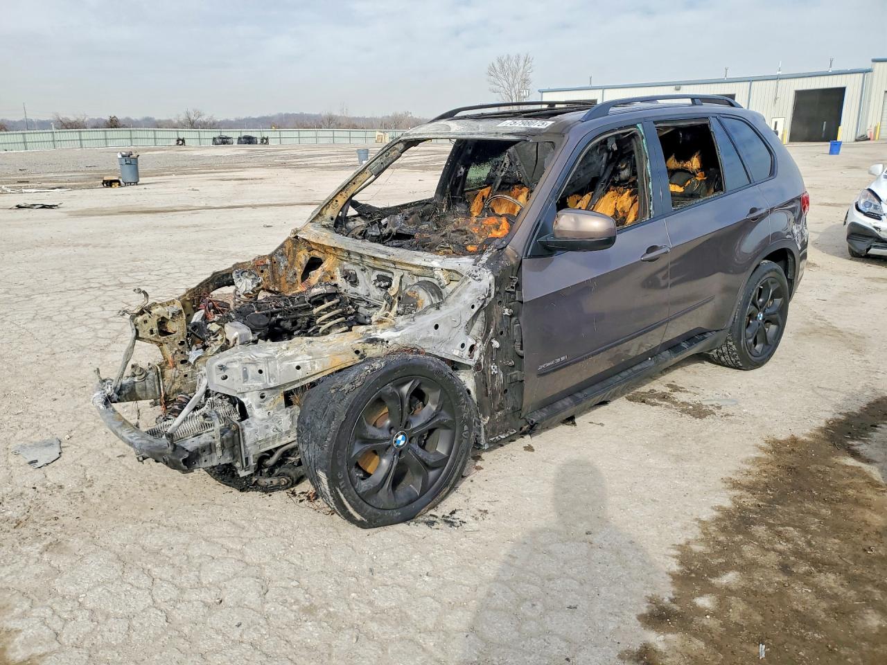 2011 BMW X5 35i, VIN 5UXZV4C52BL403260 — Пожар в салоне