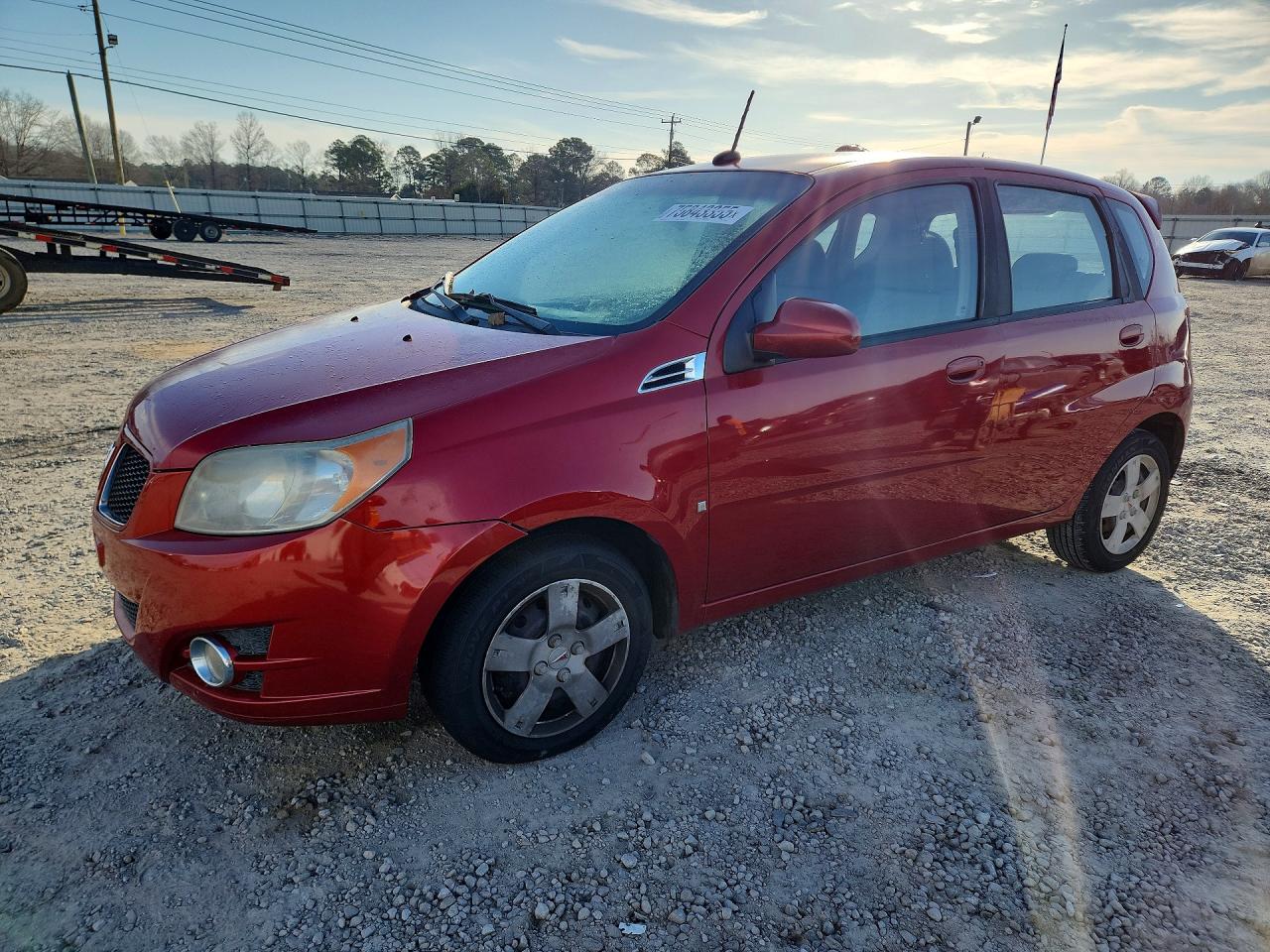 2009 Pontiac G3, VIN KL2TD66E19B687405 — Side