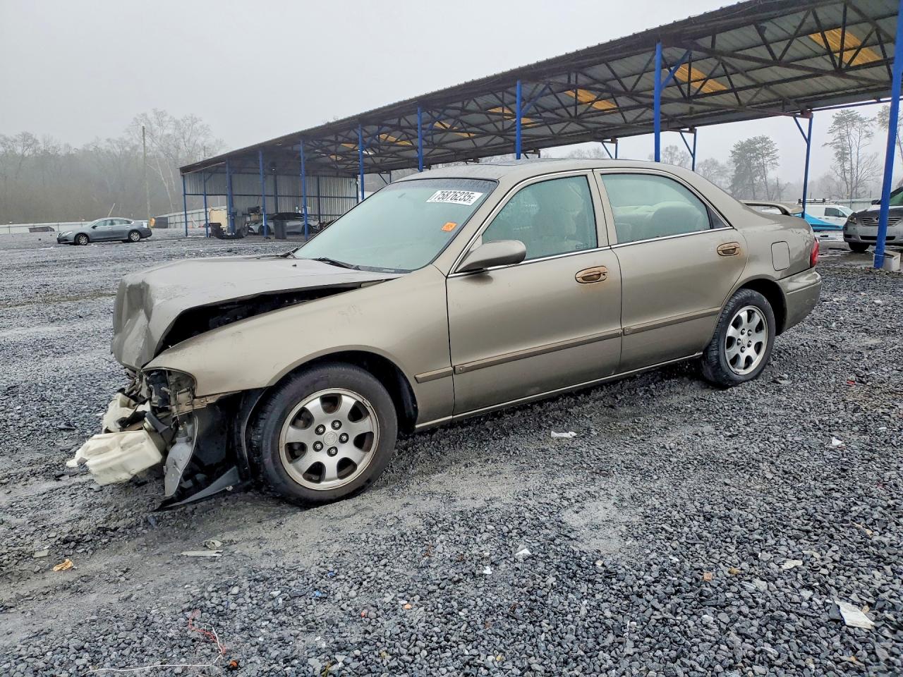 2001 Mazda 626 LX, VIN 1YVGF22C815237138 — Перед