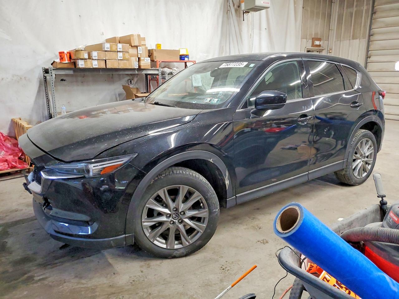 2021 Mazda CX-5 Grand Touring, VIN JM3KFBDM5M1467132 — Front end