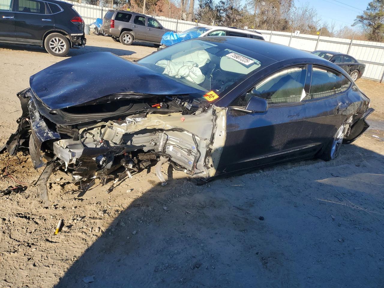2025 Tesla Model 3 Long Range, VIN 5YJ3E1EA3SF123091 — Front end