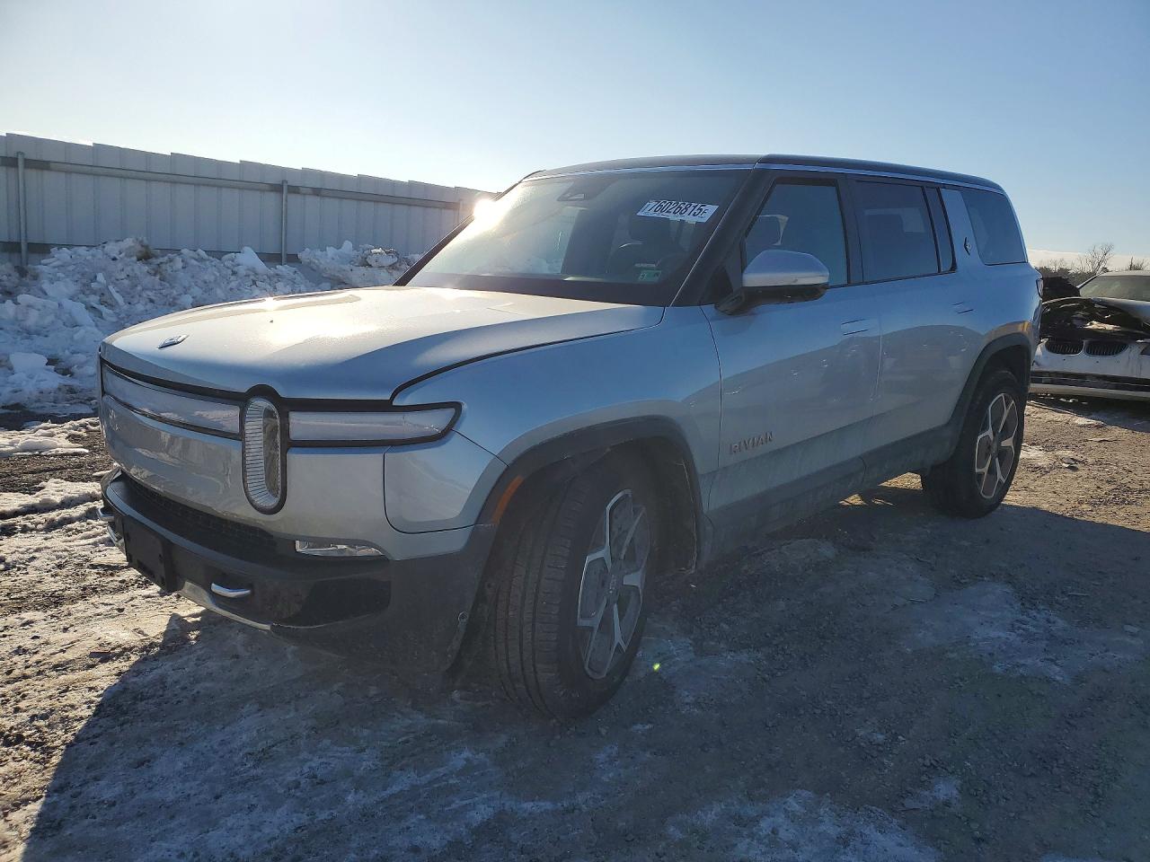2023 Rivian R1S Adventure, VIN 7PDSGABA1PN011126 — Бок