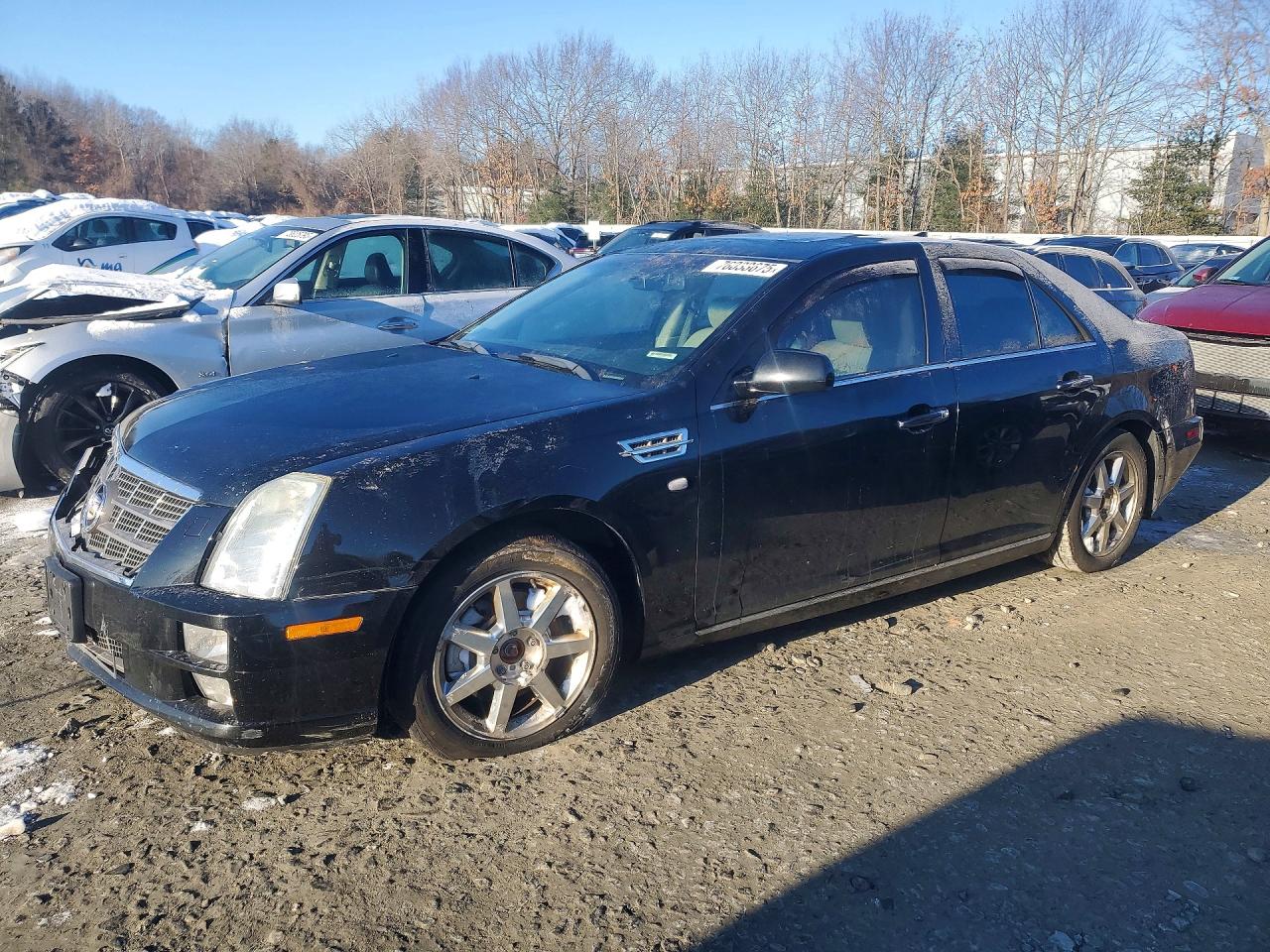 2010 Cadillac STS AWD, VIN 1G6DU6EV1A0125686 — Перед