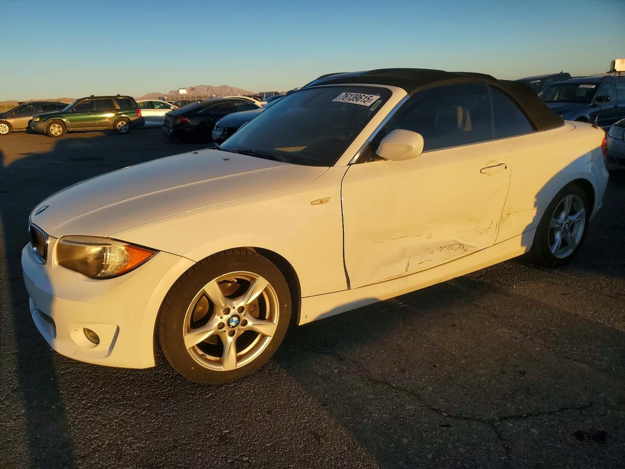 2012 BMW 1 Series 128i, VIN WBAUN1C55CVH84294 — Side