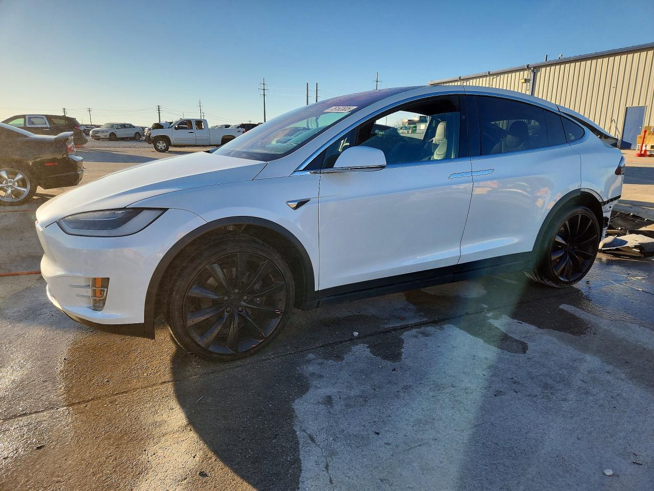 2019 Tesla Model X 75D, VIN 5YJXCBE20KF198501 — Rear end