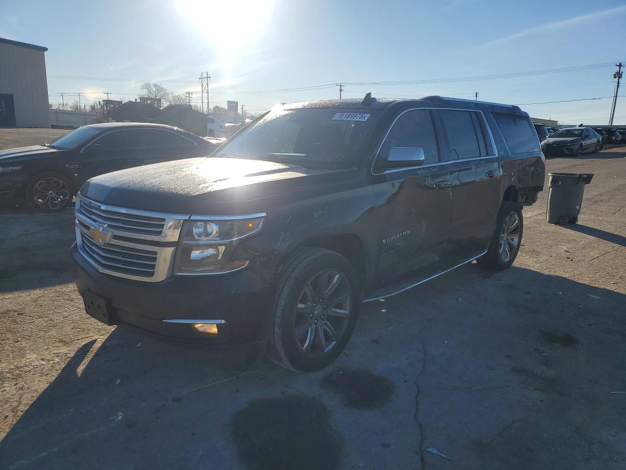 2015 Chevrolet Suburban LTZ, VIN 1GNSKKKCXFR725283 — Side