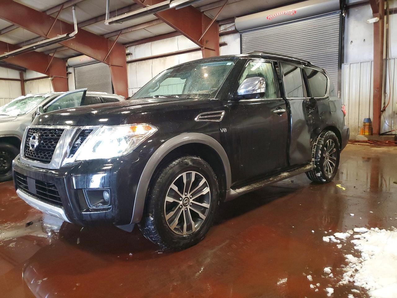 2018 Nissan Armada Platinum, VIN JN8AY2NC1J9550949 — Side