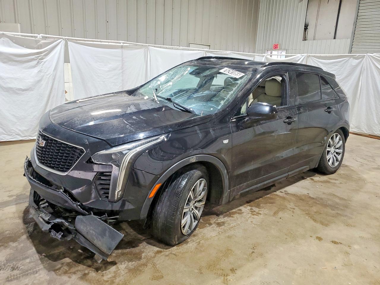 2019 Cadillac XT4 FWD Sport, VIN 1GYFZER43KF213831 — Rollover
