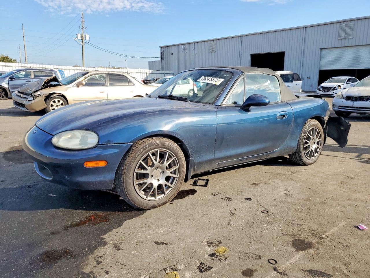 1999 Mazda MX-5 Miata, VIN JM1NB3532X0124219 — Rear end