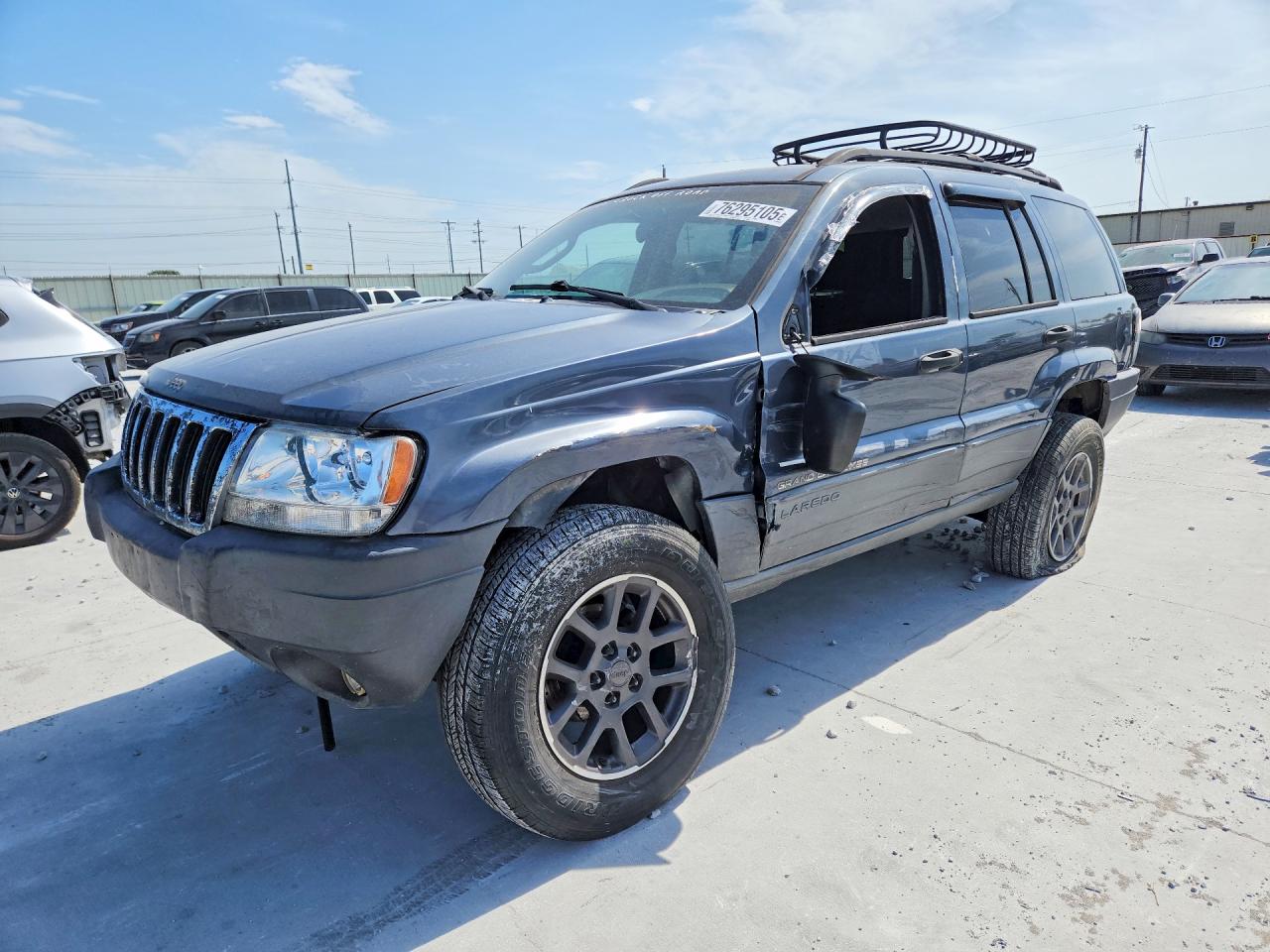 2002 Jeep Grand Cherokee Laredo, VIN 1J4GW48S62C223679 — Side