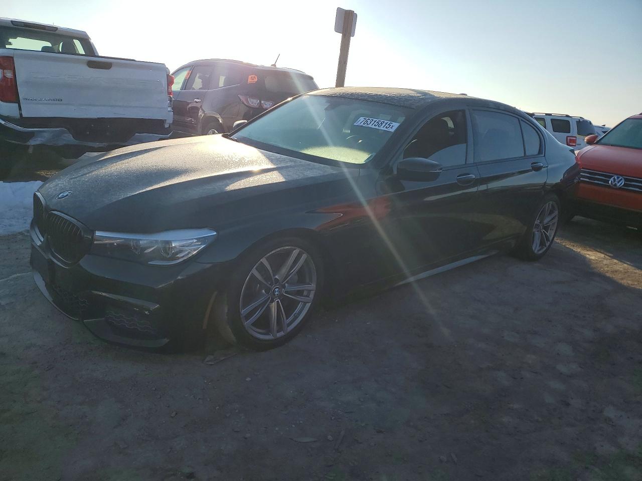 2017 BMW 7 Series 740i xDrive, VIN WBA7E4C56HGU99854 — Ранее повреждён