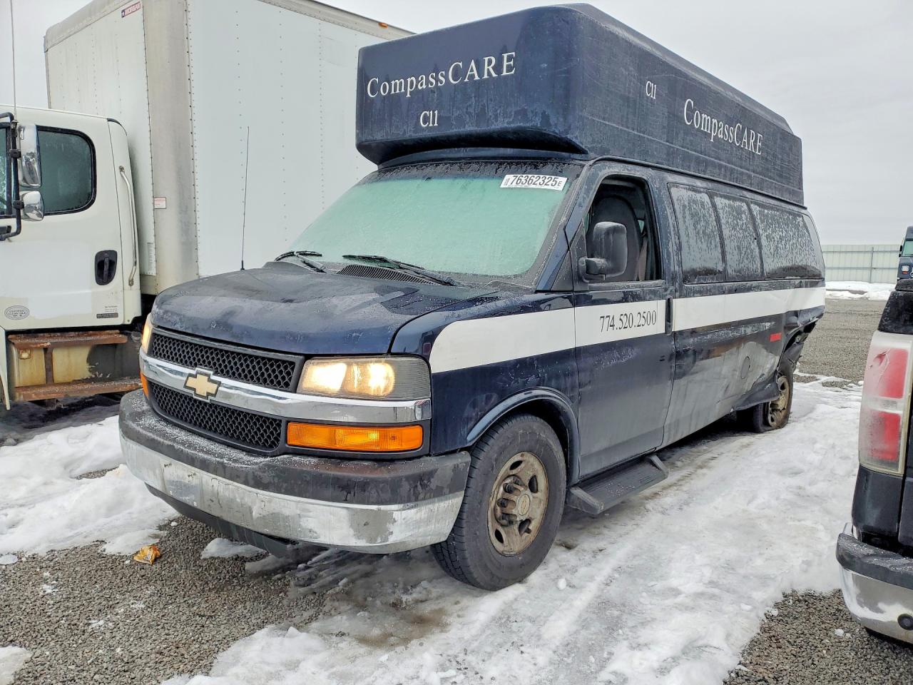 2013 Chevrolet Express Passenger LT, VIN 1GBZG1FA8D1186612 — Rear end